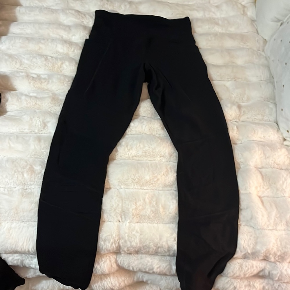 Athleta leggings with side pockets and textured detailing